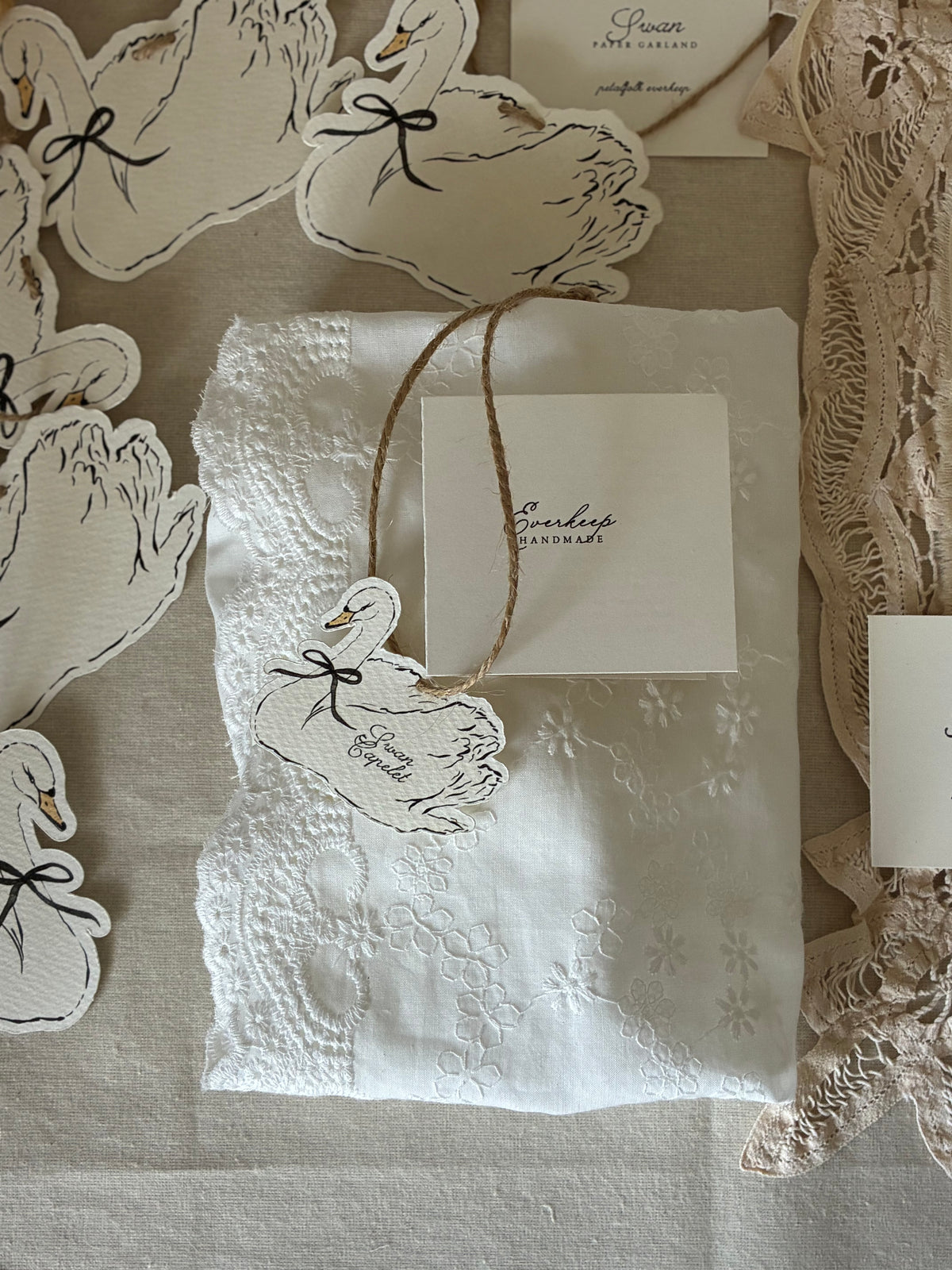 Embroidered Cotton Capelet with Swan Pendant