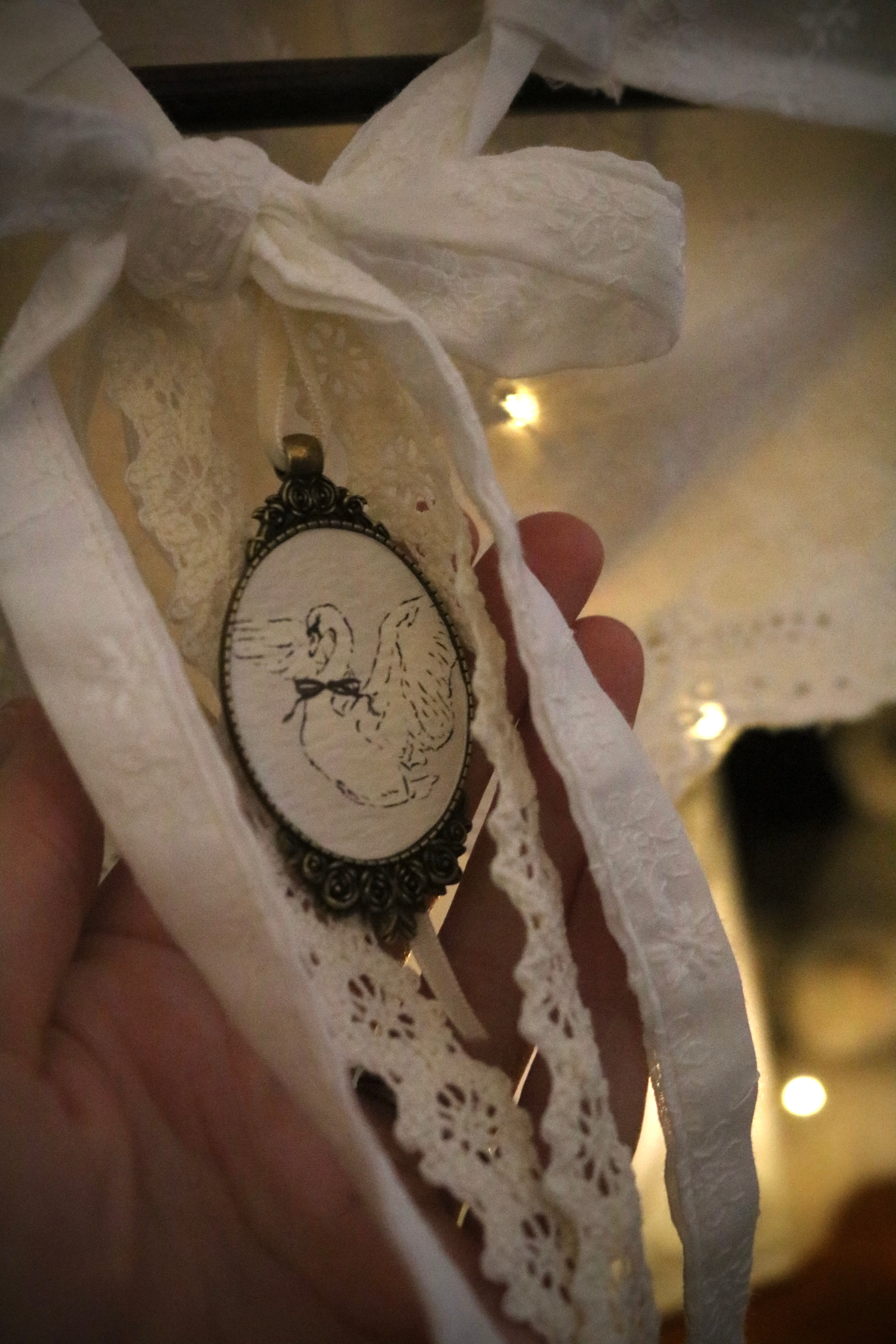 Embroidered Cotton Capelet with Swan Brooch