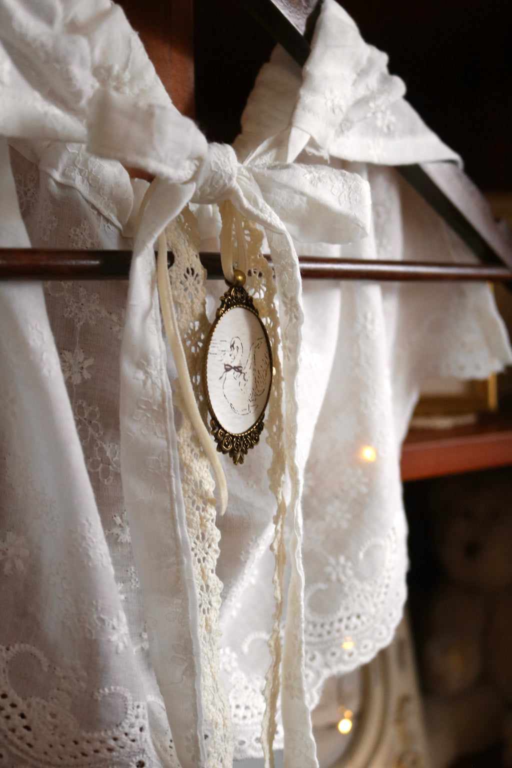 Embroidered Cotton Capelet with Swan Brooch