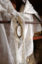 Embroidered Cotton Capelet with Swan Brooch