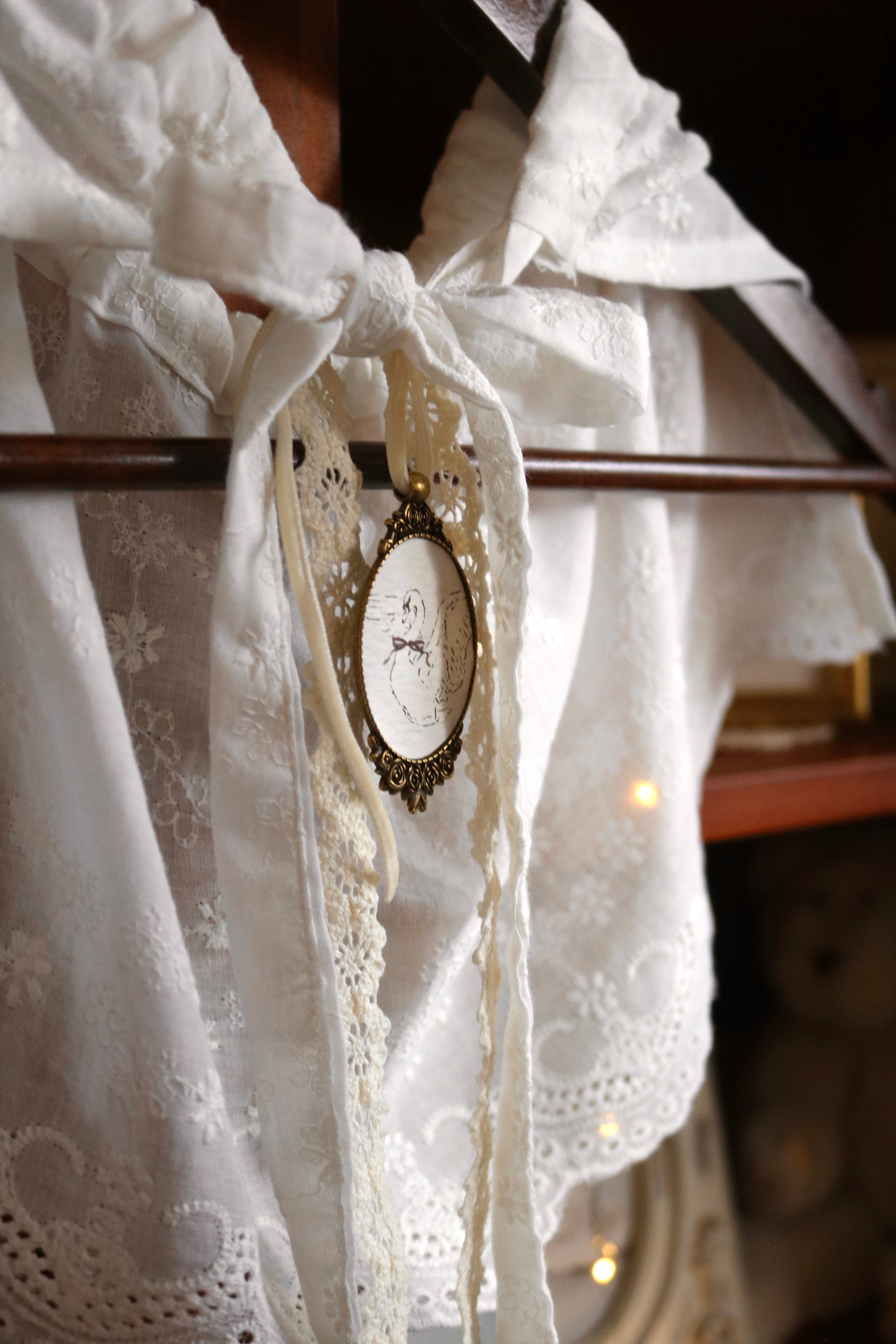 Embroidered Cotton Capelet with Swan Brooch