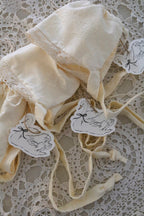 Butter Yellow Broderie Anglaise Baby Bonnet