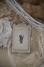 Teddy and Her Flowers | Framed