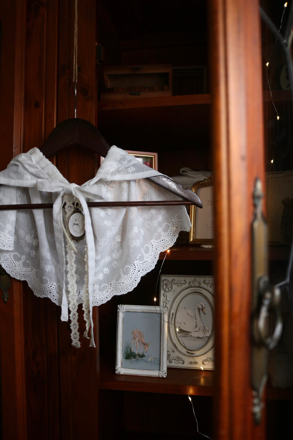 Embroidered Cotton Capelet with Swan Brooch